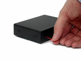 Gently press the reset switch as shown here